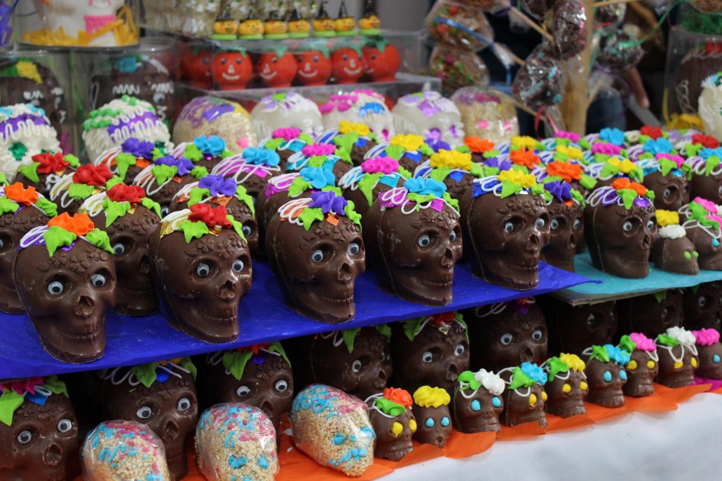 Little skulls made of chocolate on display