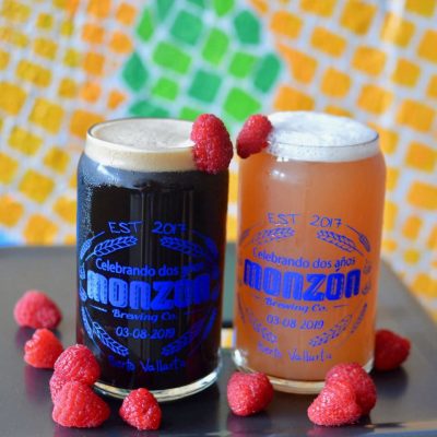 two pints of ale in raspberry chocolate flavors.