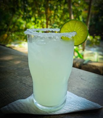 A glass of a traditional lime margarita.  