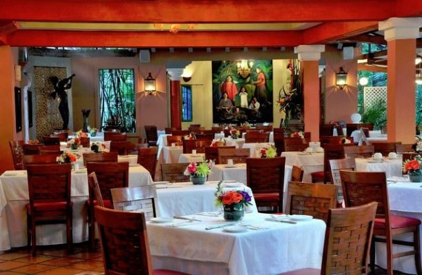 Tables in restaurant River Cafe in Puerto Vallarta