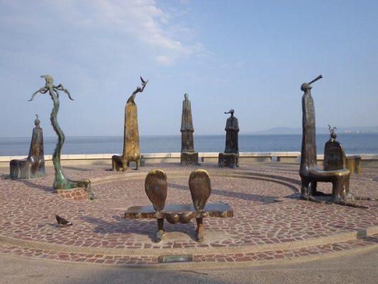 Bronze sculptures displayed on the malecon in Puerto Vallarta. 