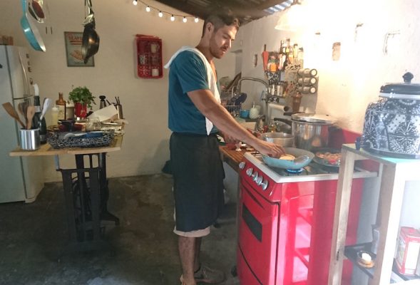 Chef Manuel is prepping a dish in his home, during a private cooking class in Puerto Vallarta.