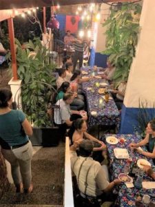 patrons gathered around tables on the patio of la fina cocina de barrio in puerto vallarta