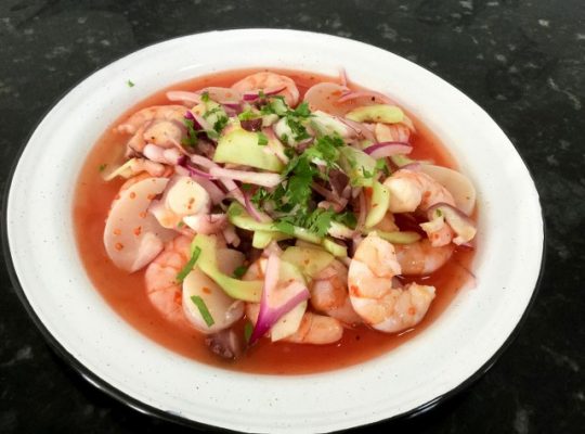 Shrimp and scallops in a clam and tomato sauce